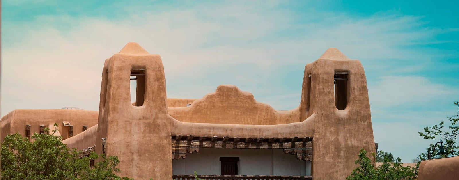 The Pueblo Revival facade of the New Mexico Museum of Art in downtown Santa Fe