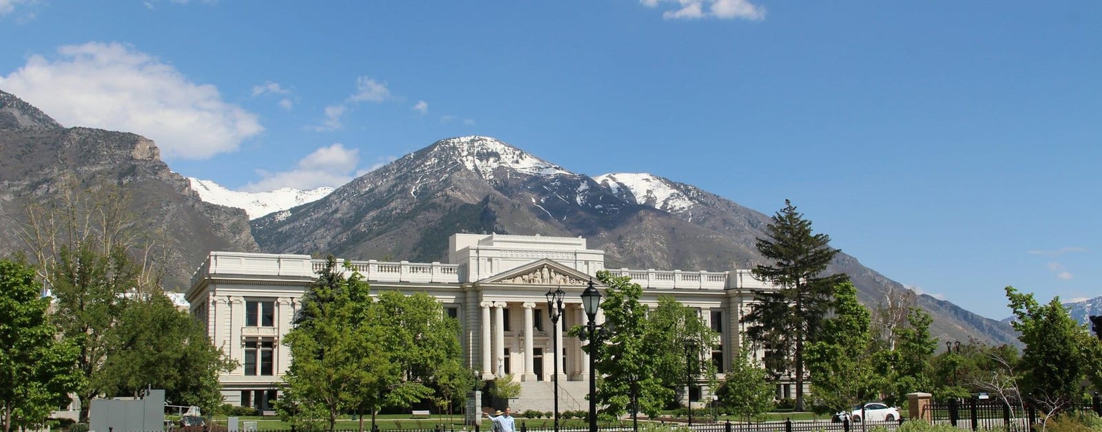 Historic Utah County Courthouse in downtown Provo, with the Wasatch Range behind