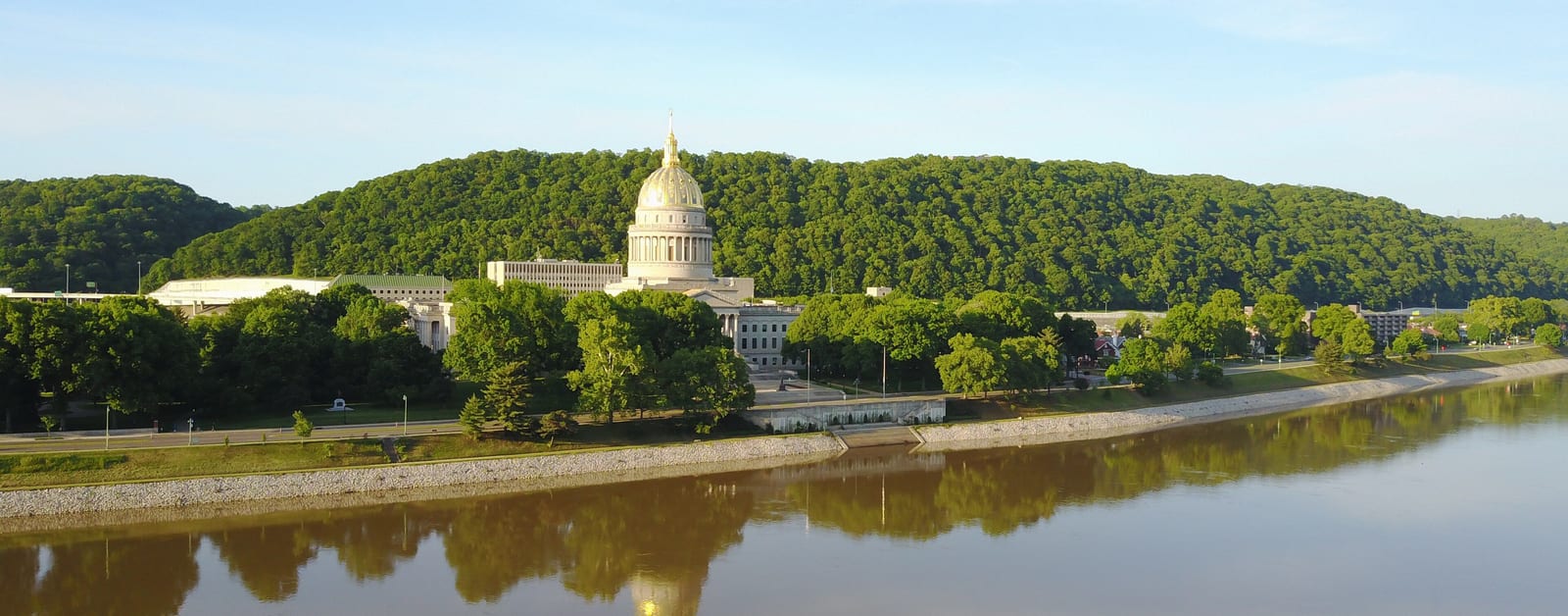 The West Virginia State Capitol's gold dome above the Kanawha River in Charleston