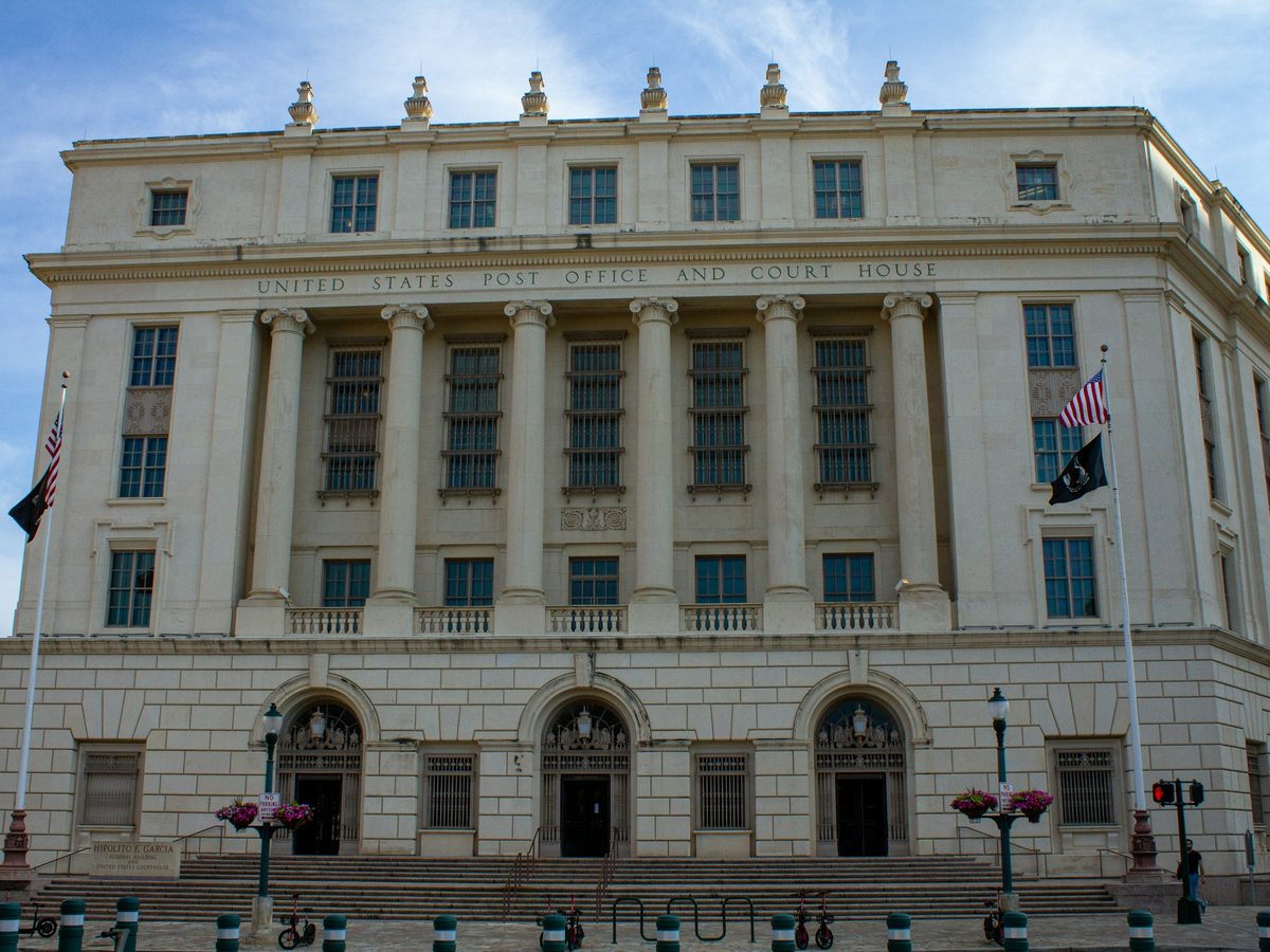United States Post Office and Court House building with flags out front